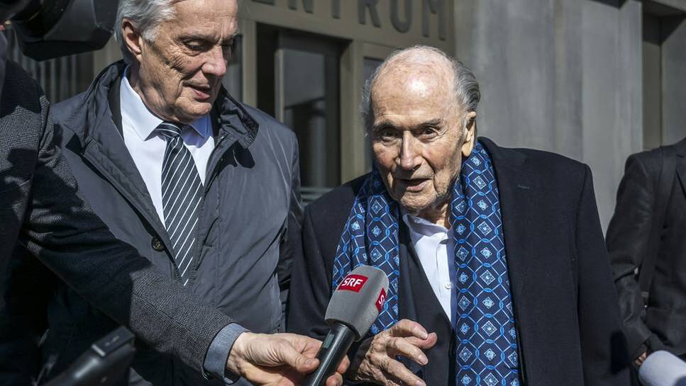 Blatter (right) on the way to the negotiation