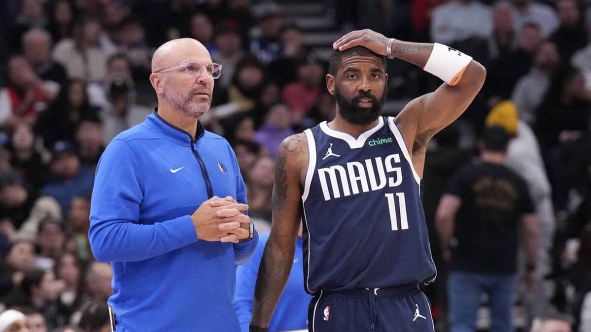 Kyrie Irving (right) apparently suffered a cruciate ligament tear