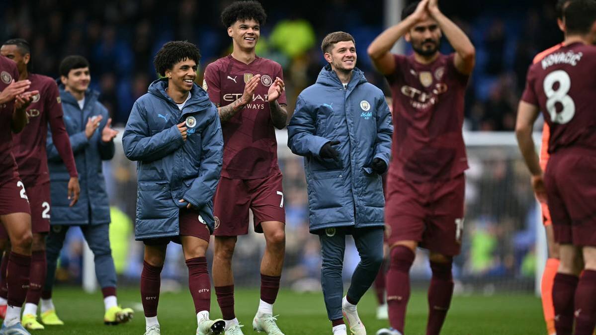 City professionals celebrate victory at FC Everton
