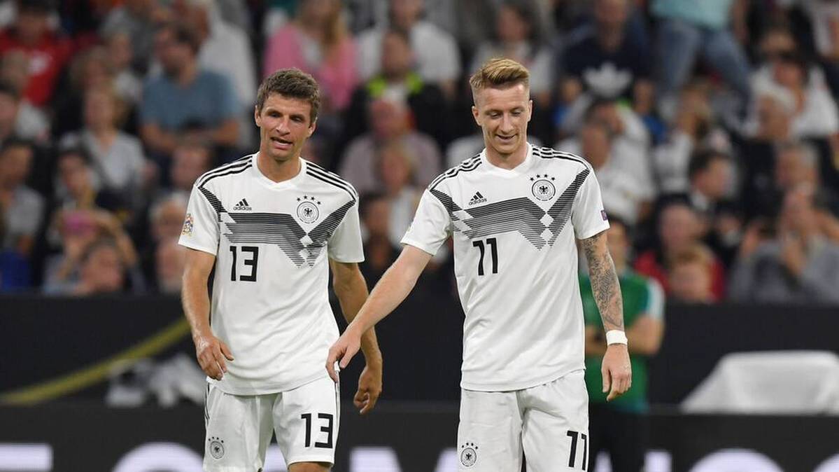 Marco Reus (right) would look forward to a change from Thomas Müller (left) to the USA