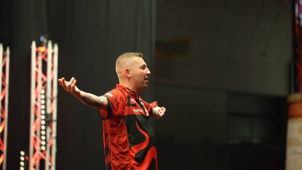 Nathan Aspinall Celebrates with the fans in Leverkusen