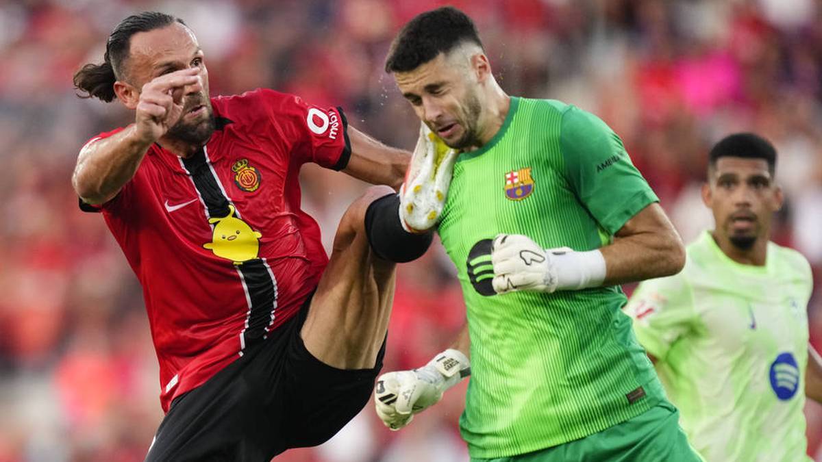 Barca's New Goalkeeper Joan Garcia is Badly hit by his opponent Vedat Muriqi in the Game in Mallorca