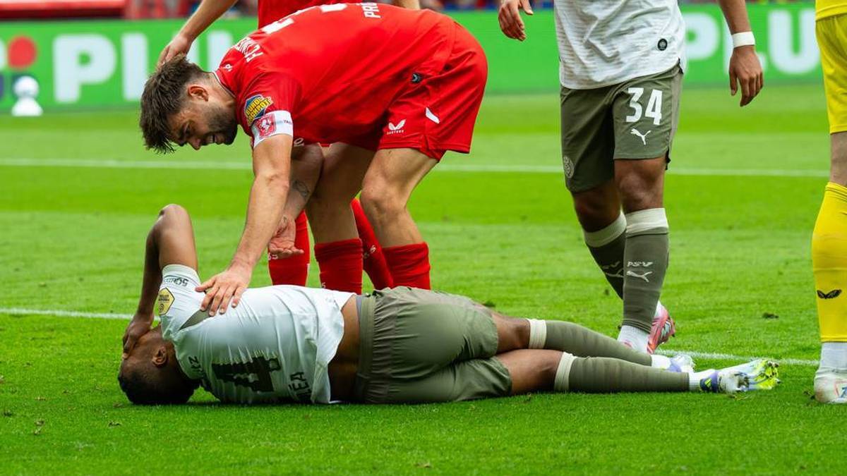 Alassane Pléa read Injured on the Ground