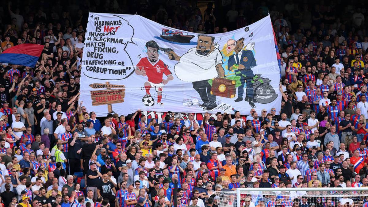 Crystal Palace fans showed a banner against Evangelos Marinakis