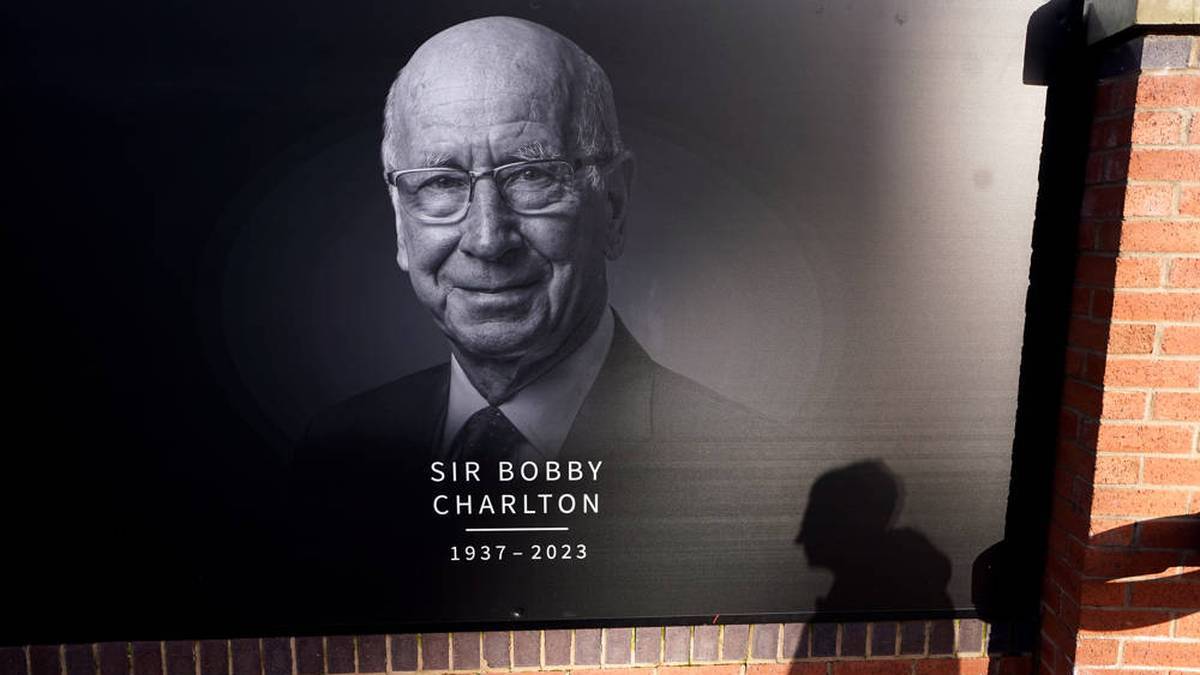 A memorial poster for Bobby Charlton in Manchester