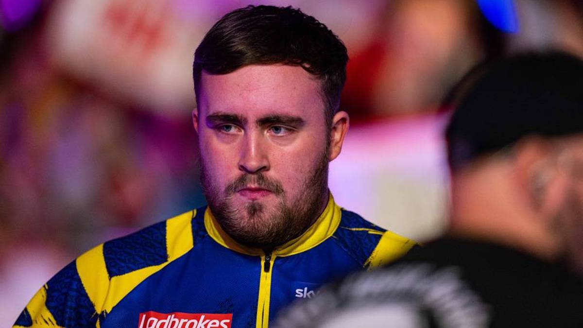 Luke Littler reacts to the World Championship draw