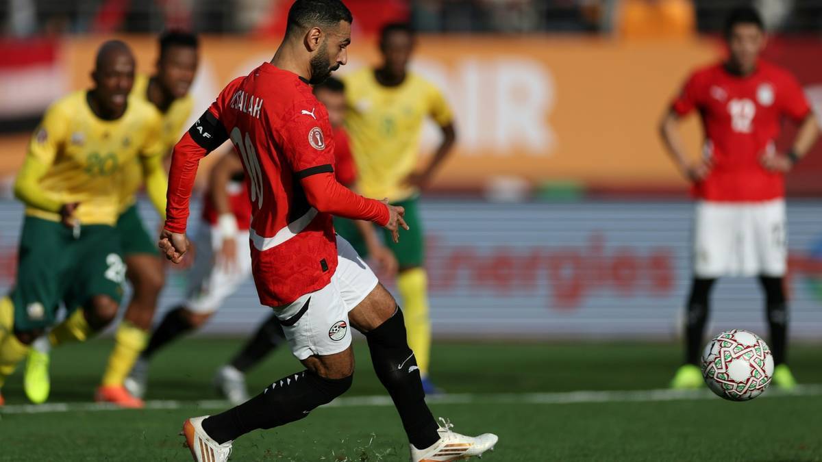 Salah converts the penalty to make it 1-0