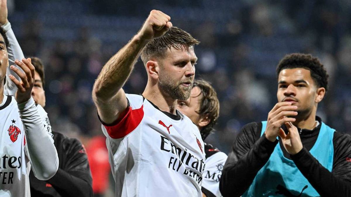 Niclas Füllkrug celebrates his first victory in a Milan jersey
